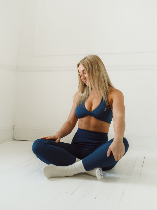 core club athletic pilates activewear, twist front halter bra, pilates outfit in navy