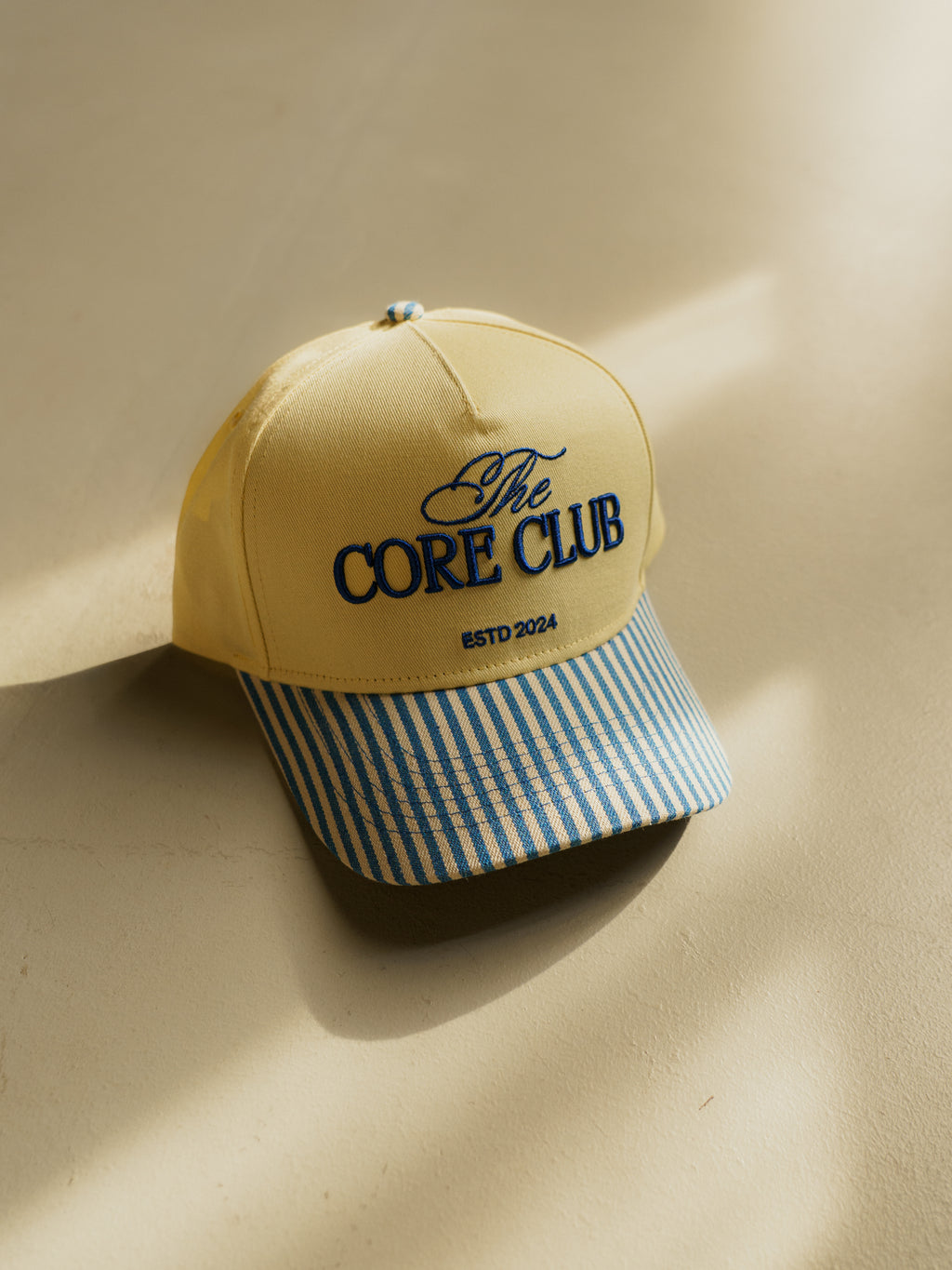 TCC Blue & Yellow Stripe Baseball Hat | Pilates Outfit Accessory