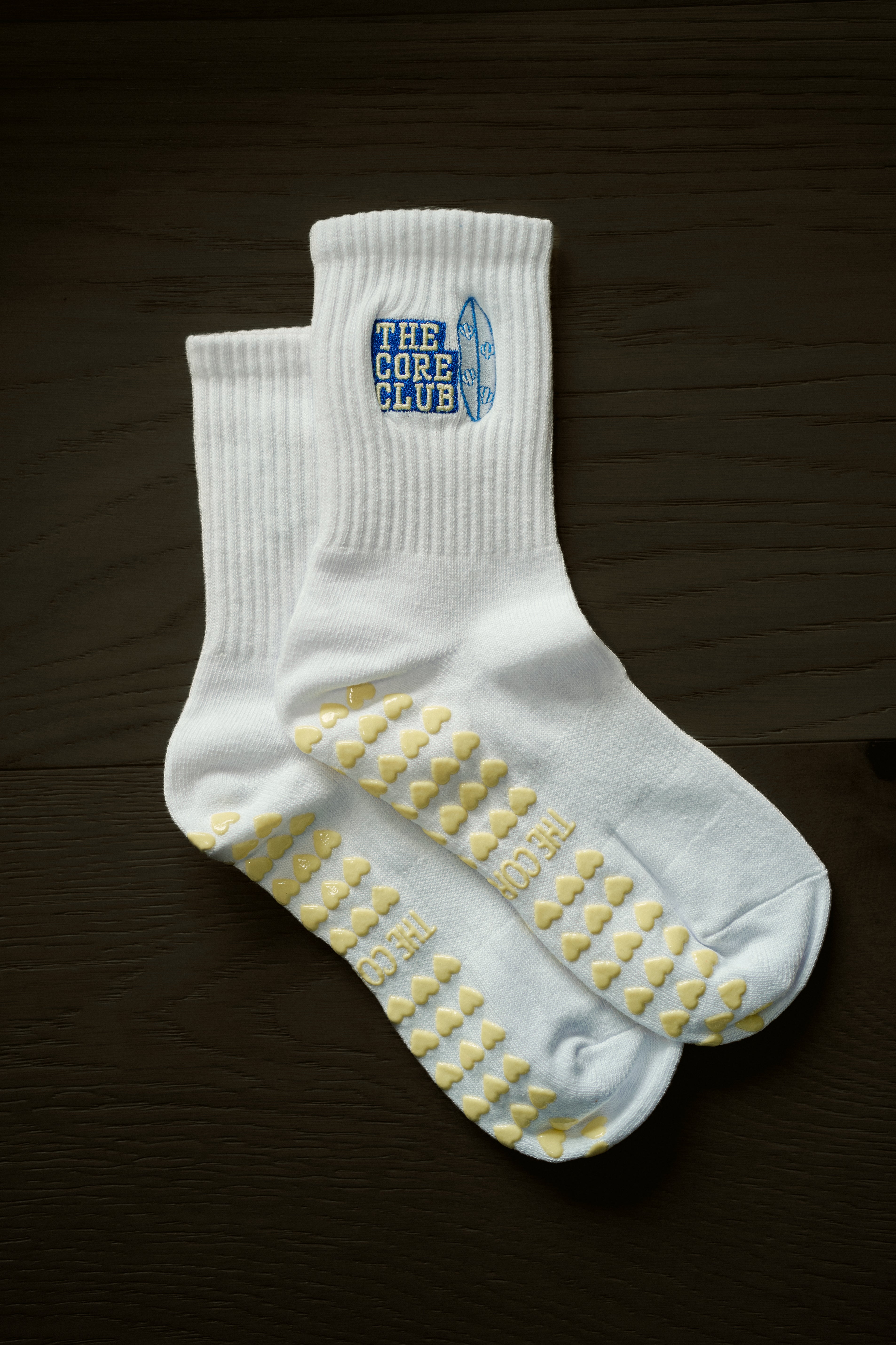 The Core Club Surfboard Sock – 100% cotton non-slip grip socks with surfboard & heart details. Perfect for Pilates, yoga, barre, or lounging in style