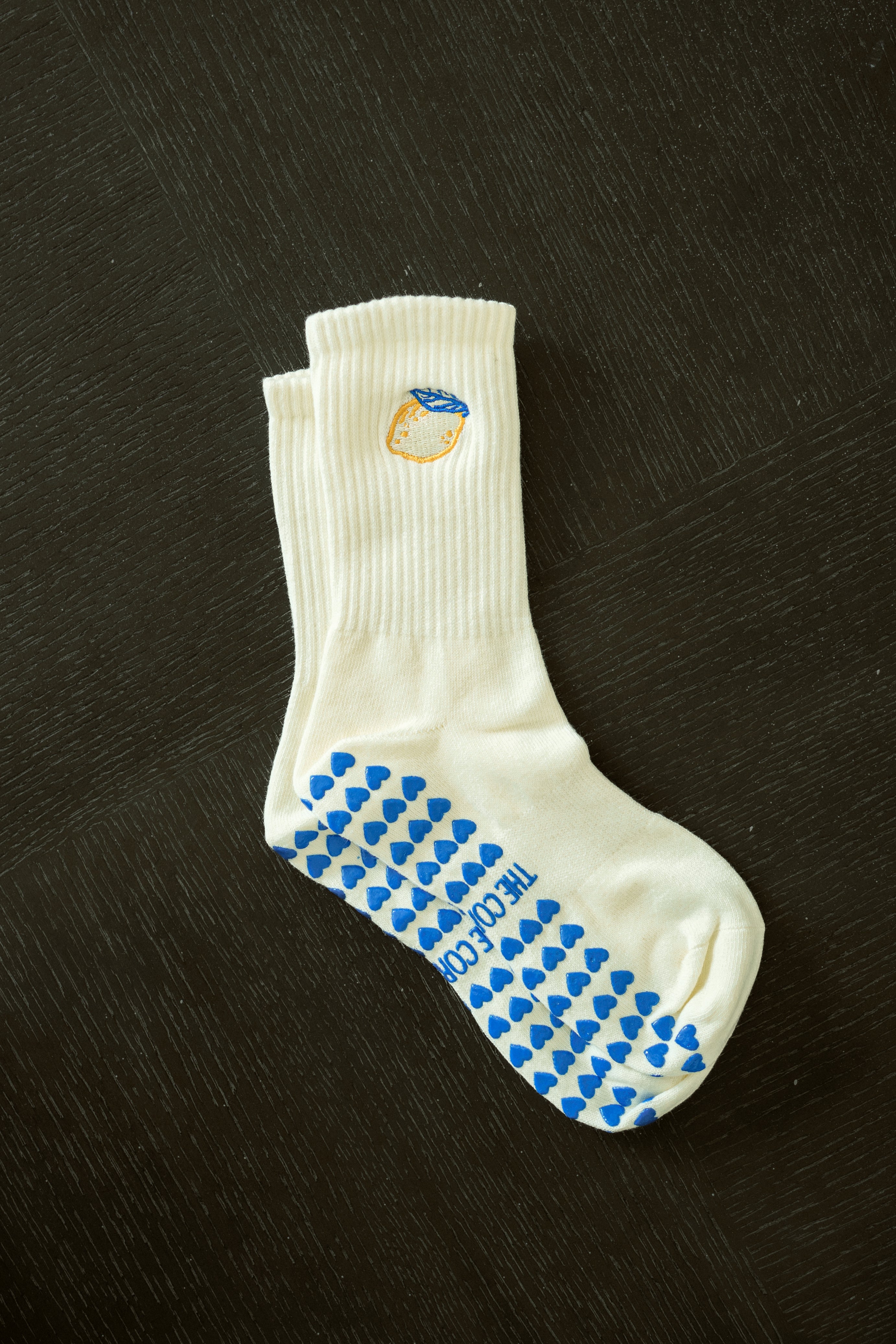 Lemon Zest Grip Pilates Sock – light yellow cotton non-slip socks with yellow & blue embroidered lemons and blue heart grippies. Perfect for Pilates, yoga & barre