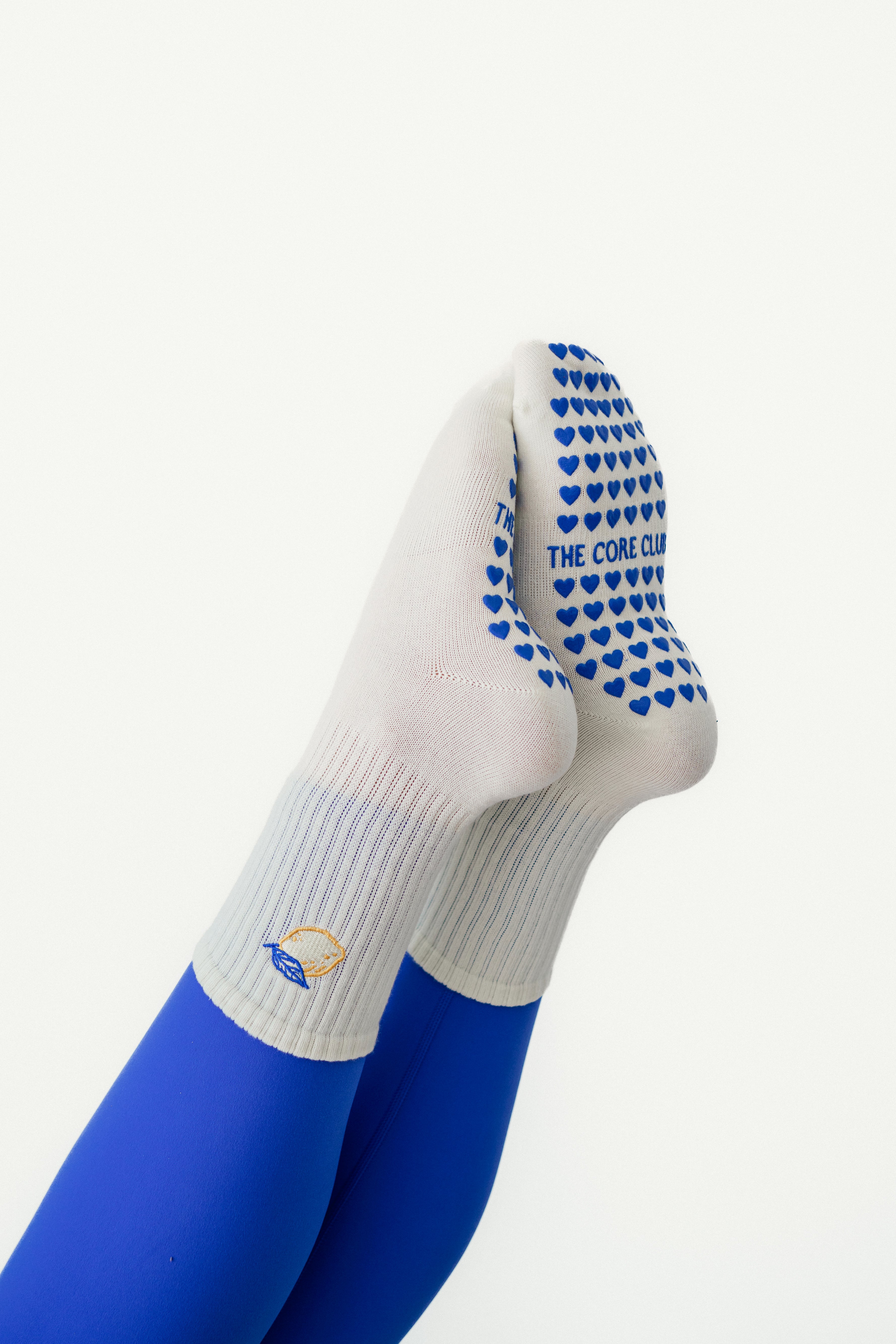 Lemon Zest Grip Pilates Sock – light yellow cotton non-slip socks with yellow & blue embroidered lemons and blue heart grippies. Perfect for Pilates, yoga & barre