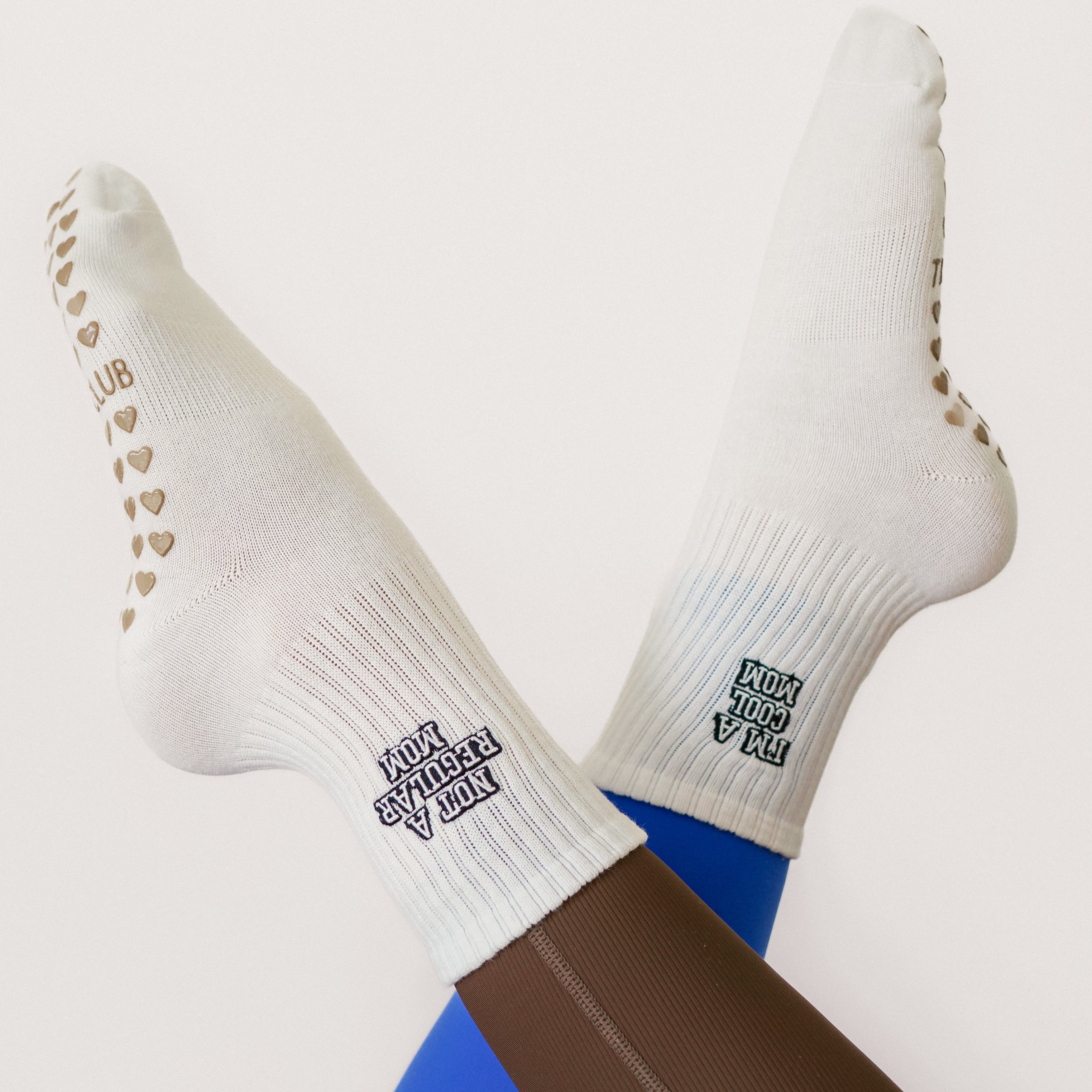 The Core Club Not A Regular Mom, I’m a Cool Mom Grip Pilates Sock – soft cotton non-slip socks with black embroidery & tan heart grippies. Perfect for Pilates & yoga.