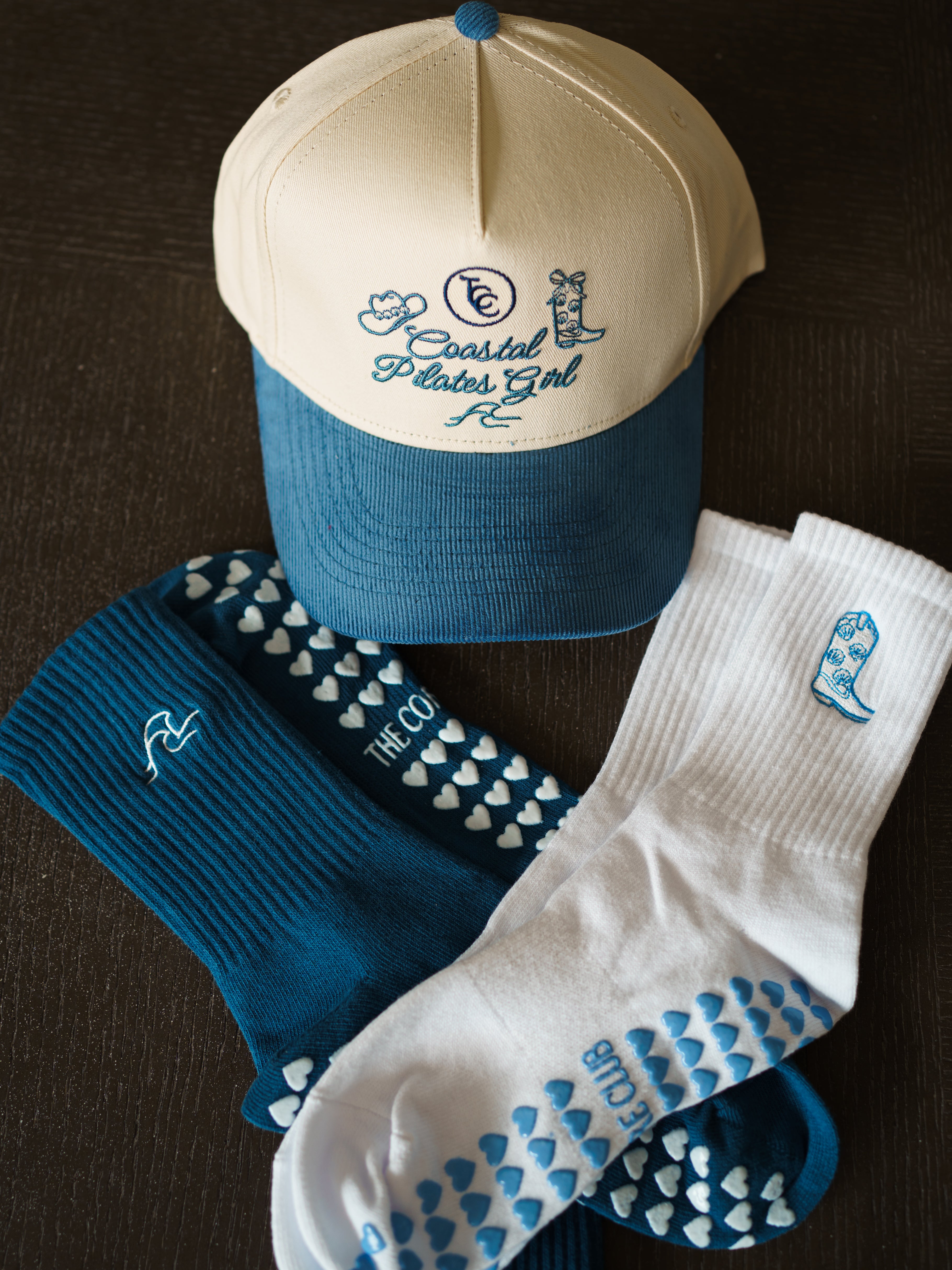TCC Blue embroidery baseball hat with corduroy brim, coastal pilates girl vibes, coastal pilates girl grip socks for pilates and barre workouts
